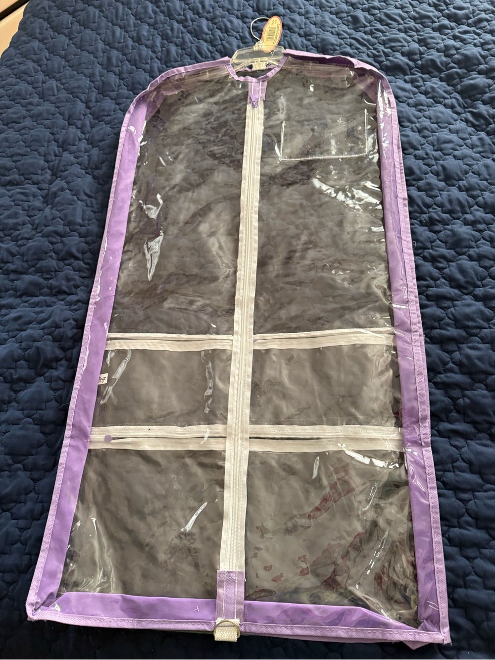 Clear Garment Bag with Purple Trim and Multiple Zippered Pockets